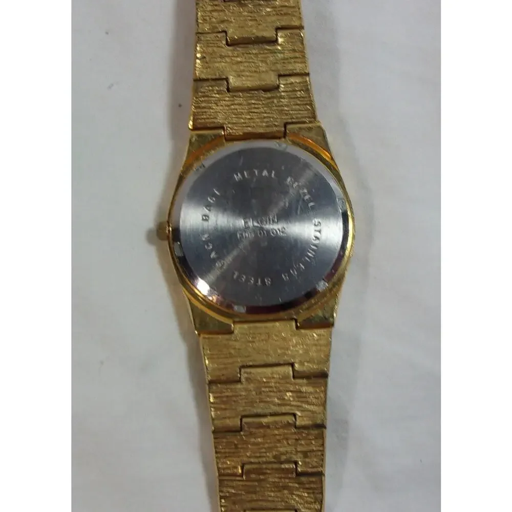 VINTAGE ELGIN FND 01 012 QUARTZ WATCH-RUNS